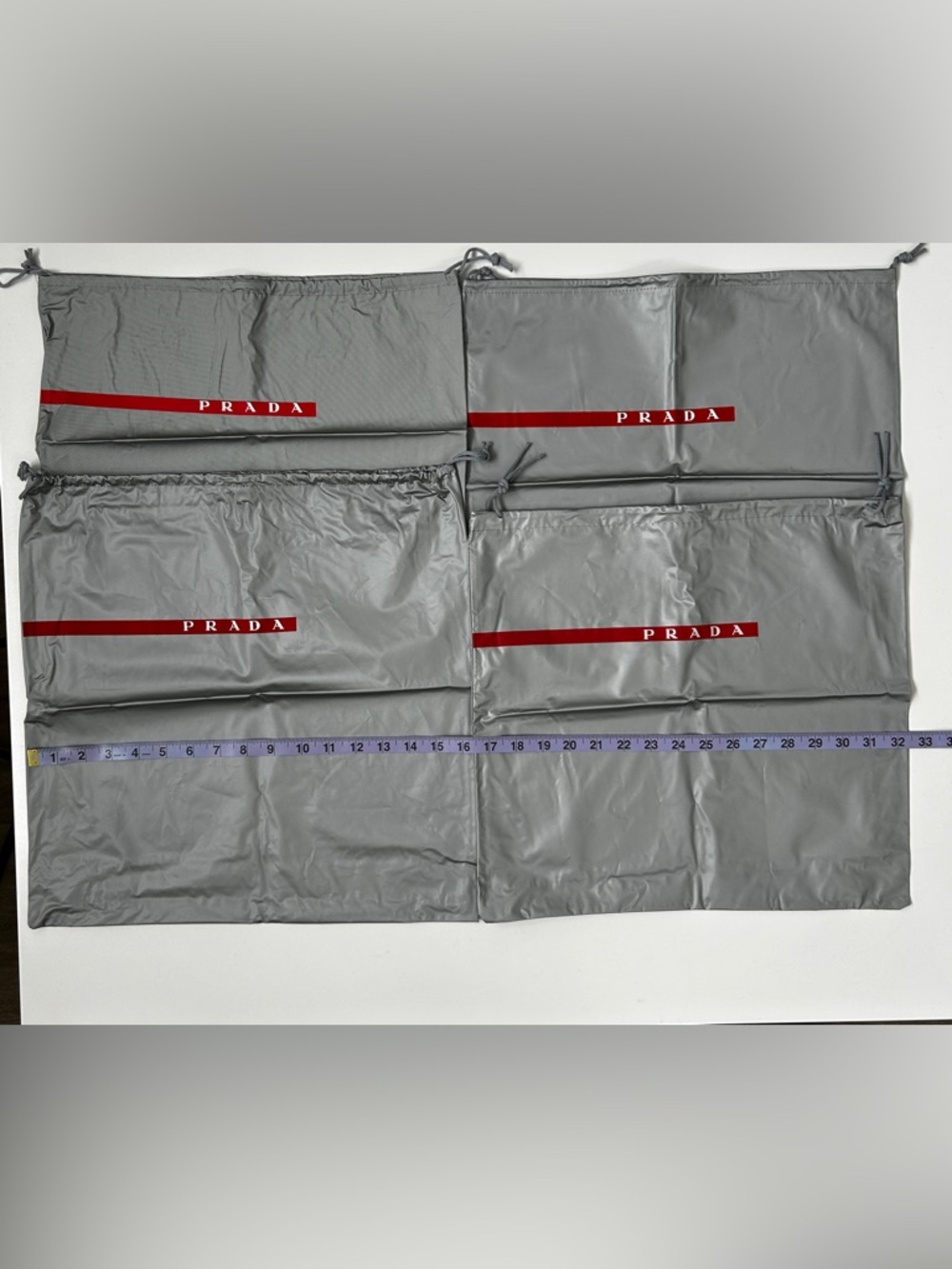 Prada Gray Drawstring Dust Bags with Red Logo Stripe